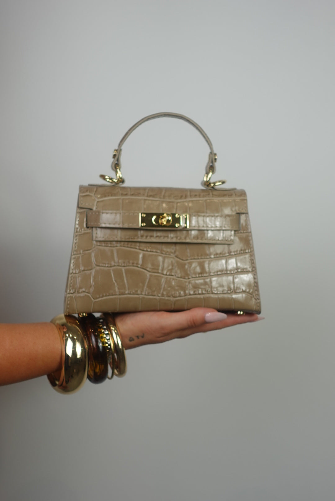 Sac en cuir petit format - croco taupe