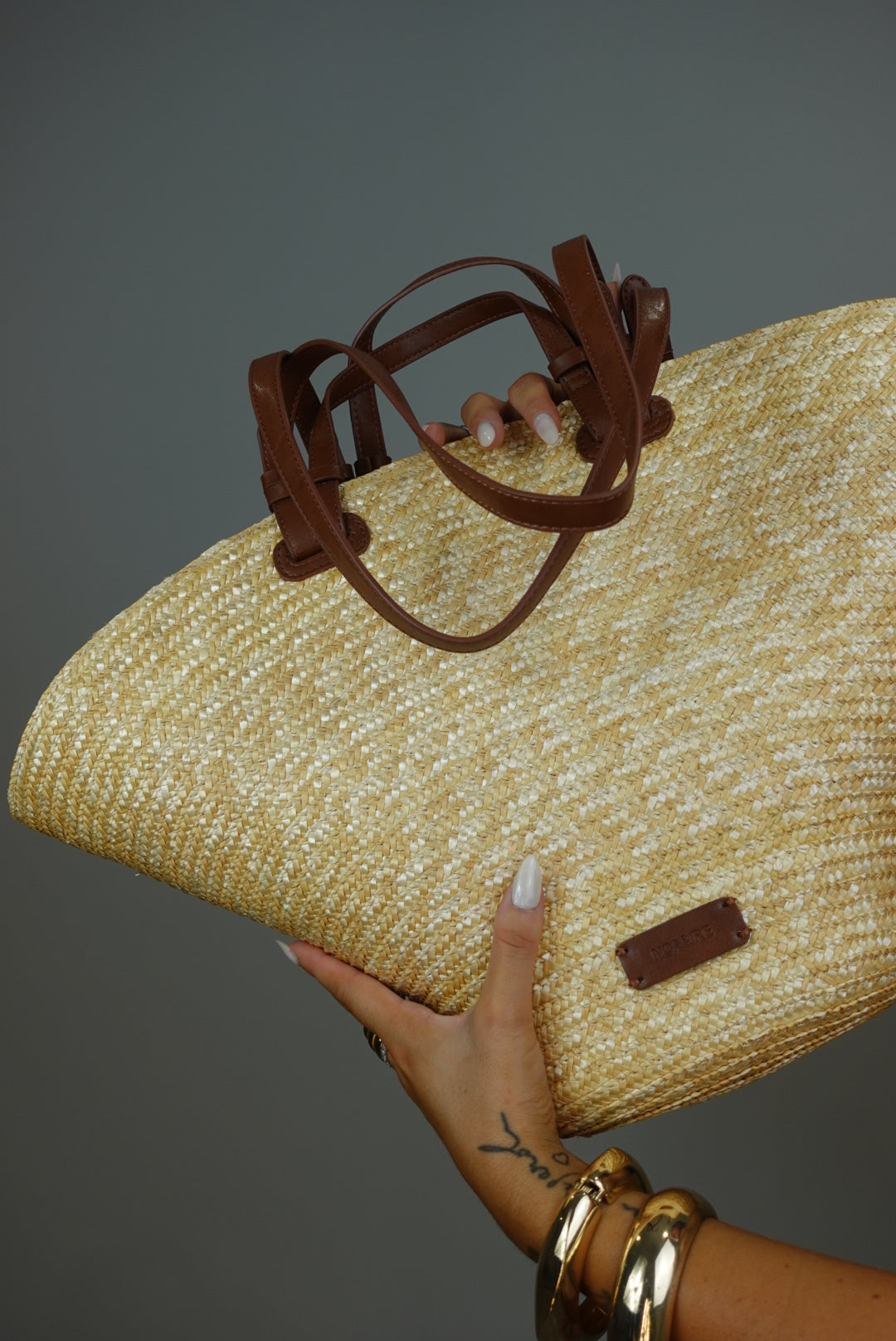 Le sac en osier - lanières cognac