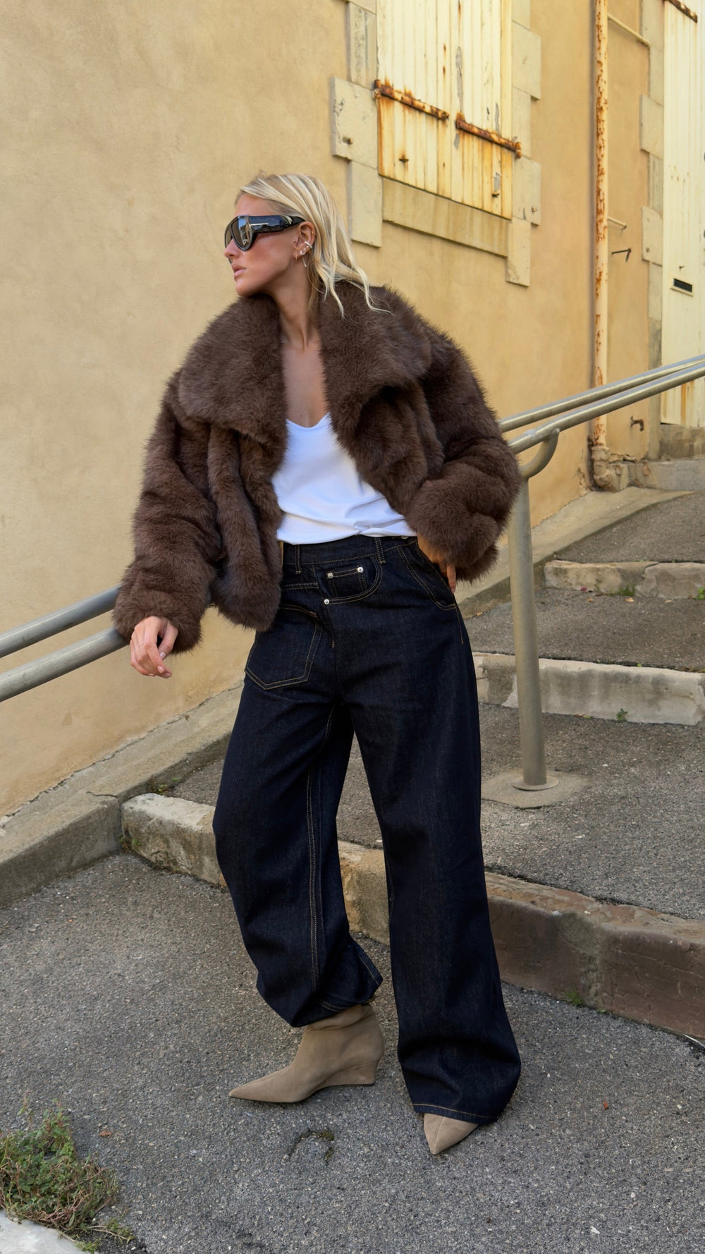Raw asymmetric jeans